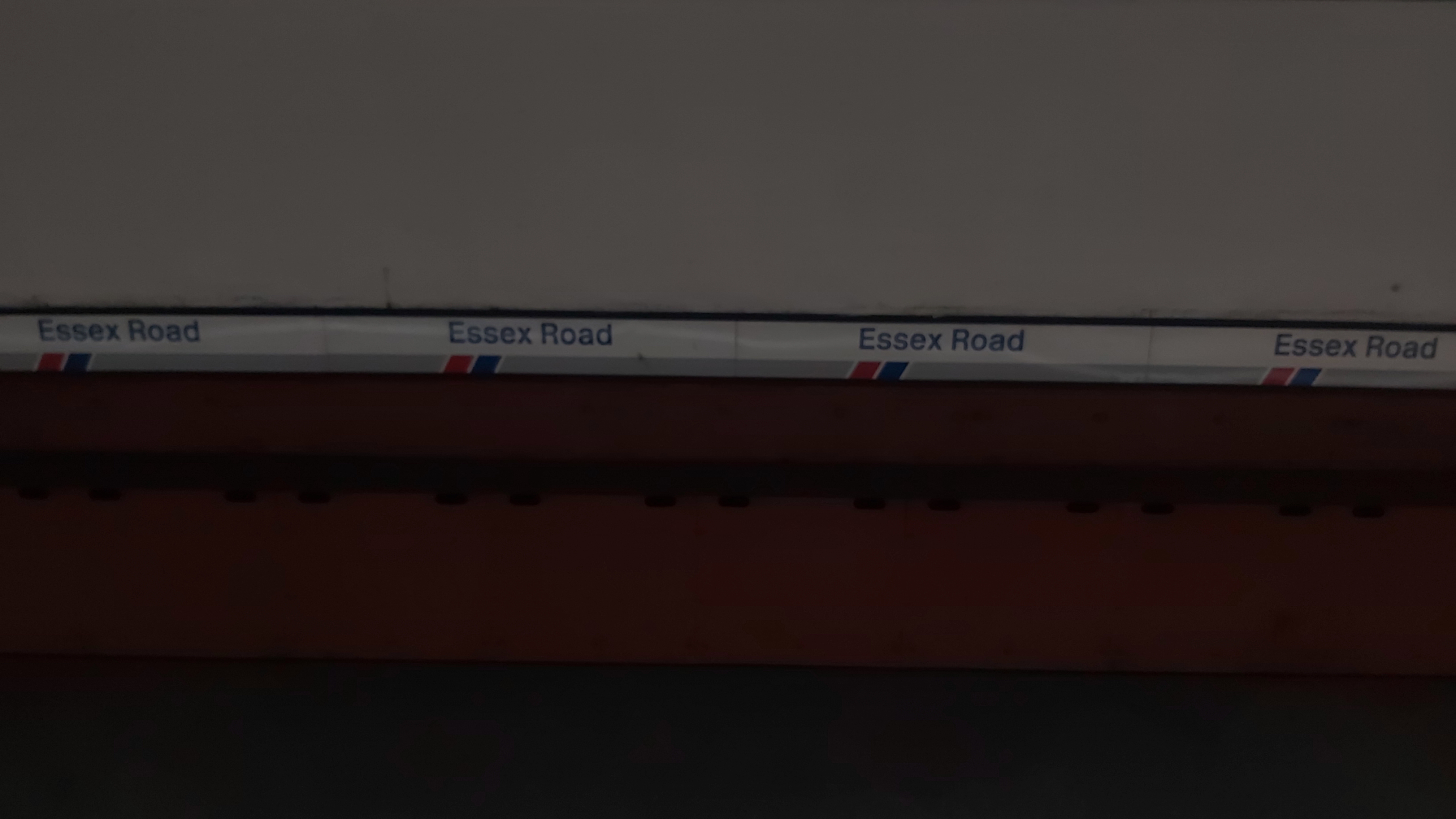A landscape picture of the Essex Road banner.